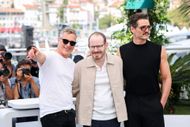 Joaquin Phoenix, Ari Aster, and Pedro Pascal at Cannes (Image via Getty)